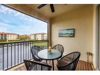 Relaxing screened balcony overlooking a lake at 980 Cooper St # 302, Venice, FL 34285