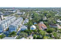 An aerial view of a charming neighborhood showcasing lush greenery and beautiful homes at 1920 Laurel St, Sarasota, FL 34236