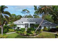 Stunning aerial view of a single-Gathering home at 2029 Calusa Lakes Blvd, Nokomis, FL 34275
