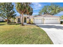 Beautiful one-story home with two-car garage and lush landscaping at 4724 White Tail Ln, Sarasota, FL 34238