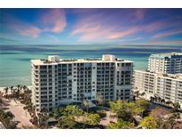 Stunning beachfront condos boast private balconies overlooking the ocean and lush landscaping at 1800 Benjamin Franklin Dr # A304, Sarasota, FL 34236