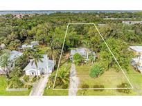 Aerial view of a single Gathering home and lot at 25318 Marion Ave, Punta Gorda, FL 33950