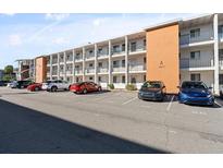 Building exterior with ample parking at 5902 Garden Ln # A24, Bradenton, FL 34207