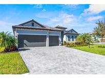 Charming single-Gathering home with a spacious three-car garage and paved driveway at 4906 Lighthouse Bay Ln, Bradenton, FL 34211