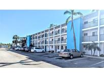 Building exterior showcasing a contemporary design and ample parking at 2228 Canal Dr # D26, Bradenton, FL 34207