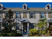 Charming townhome with green shutters and landscaping at 5662 Duval St, Bradenton, FL 34203