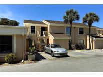 Exterior view of condo building, showing building facade and parking area at 6312 7Th W Ave # 6312, Bradenton, FL 34209