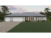 New home exterior featuring a two-car garage and attractive landscaping at 16150 Ortega Dr, Punta Gorda, FL 33955