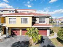 Two-story townhome with double garage and a lake view at 5601 Bentgrass Dr # 10-117, Sarasota, FL 34235