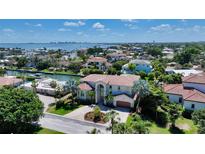 Luxury waterfront home in a prestigious gated community with stunning bay views at 510 Bowsprit Ln, Longboat Key, FL 34228
