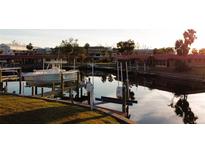Aerial view of waterfront community with boat slips and canal at 4104 Catalina Dr, Bradenton, FL 34210