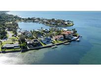 Aerial view of waterfront home with private backyard and expansive water views at 333 N Shore Dr, Sarasota, FL 34234