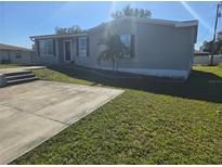 Single-story house with a large yard at 3105 Sunrise Trl, Port Charlotte, FL 33952