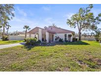 Charming single-story home with a well-maintained lawn and inviting front porch at 5111 26Th St. Ct, W # 53, Bradenton, FL 34207