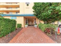 Attractive building exterior with well-maintained landscaping and inviting entrance at 4550 Pinebrook Cir # 304, Bradenton, FL 34209