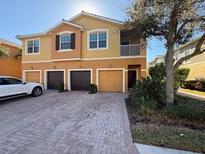 Attractive townhome with attached garage and paved driveway at 5467 Soapstone Pl # 203, Sarasota, FL 34233