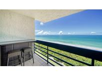 Breathtaking ocean view from balcony with patio furniture at 1055 Gulf Of Mexico Dr # 504, Longboat Key, FL 34228