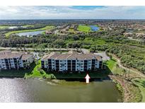 Luxury condo building with water and golf course views at 7005 River Hammock Dr # 103, Bradenton, FL 34212