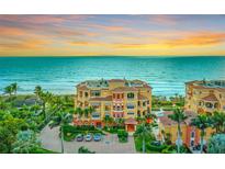 Luxury beachfront condo building with ocean views and resort-style amenities at 4125 Gulf Of Mexico Dr # S201, Longboat Key, FL 34228