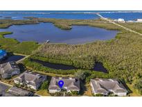 Aerial view showing condo location near water at 636 Estuary Dr # 636, Bradenton, FL 34209