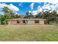 Ranch style home with mature landscaping and a spacious yard at 7321 Proctor Rd, Sarasota, FL 34241