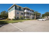 Two-story apartment building with parking and landscaping at 4802 51St W St # 1406, Bradenton, FL 34210