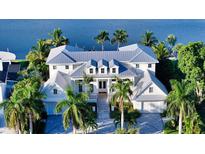 Luxury waterfront home with metal roof and pool at 178 N Washington Dr, Sarasota, FL 34236