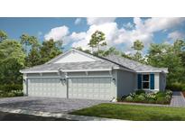 Two-car garage home with gray shingle roof and landscaped lawn at 6005 Mesa Gln, Bradenton, FL 34203