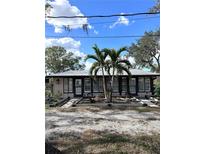 Updated Ranch home with metal roof, landscaping, and spacious driveway at 6504 Lincoln Rd, Bradenton, FL 34203