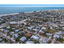 Wide aerial showcasing the property's location near the beach at 213 83Rd St # East/A, Holmes Beach, FL 34217