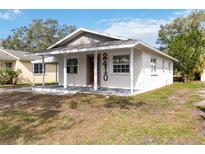 Newly renovated home showcasing a clean, light-colored exterior at 2410 13Th W St, Palmetto, FL 34221