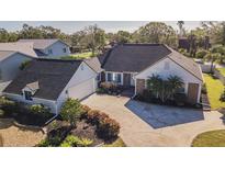 Attractive single-story home with a two-car garage and nicely landscaped yard at 3808 El Conquistador Pkwy, Bradenton, FL 34210