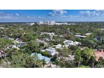 Aerial view of a two-story house nestled in a neighborhood at 1103 Citrus Ave, Sarasota, FL 34236