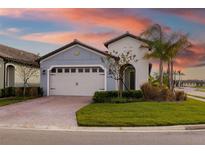 Curb appeal abounds at this charming one-story home, showcasing a two-car garage at 1901 6Th E St, Palmetto, FL 34221