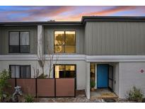 Charming townhome with a blue front door and neat landscaping at 4001 Beneva Rd # 304, Sarasota, FL 34233