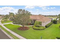Lovely single-Gathering home with manicured landscaping and mature trees in a well-maintained community at 2611 Little Country Rd, Parrish, FL 34219
