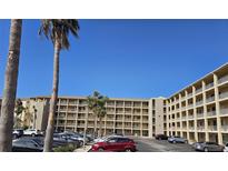Spacious condominium featuring multiple balconies and ample parking in a tropical setting at 3682 Lake Bayshore Dr # K402, Bradenton, FL 34205