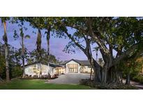 Stunning two-story home with grand entrance and mature trees at 4620 Riverview Blvd, Bradenton, FL 34209