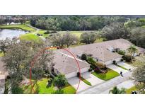 Well-maintained single-Gathering home with lush landscaping, attached garage, and neutral color palette at 6314 Stone River Rd # 6314, Bradenton, FL 34203