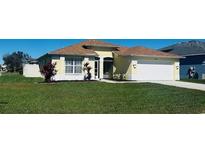 Charming single-story home with well-maintained lawn and attached two-car garage at 4515 50Th W Dr, Bradenton, FL 34210