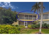 Condo with large screened lanai overlooking lush tropical landscaping and palm trees at 6101 34Th W St # 33D, Bradenton, FL 34210