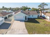 Charming single-Gathering home with well-manicured lawn and attached garage at 7807 24Th W Ave, Bradenton, FL 34209