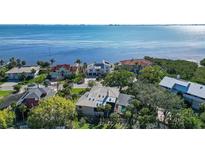 Stunning waterfront homes along the bay with lush landscaping and beautiful views at 4003 Bayside Dr, Bradenton, FL 34210