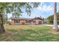 Charming single-Gathering home with a brick facade and well-manicured lawn at 1622 17Th E St, Bradenton, FL 34208