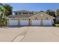 Attached garages provide ample parking and storage space for residents and their vehicles at 1669 Monarch Dr # 201, Venice, FL 34293