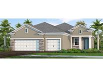 Charming single-story home with a three-car garage and beautifully landscaped front yard at 17650 Meandering Palms Xing, Bradenton, FL 34212