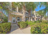 Inviting two-story townhome with lush landscaping and private balcony at 3760 82Nd Avenue E Cir # 101, Sarasota, FL 34243