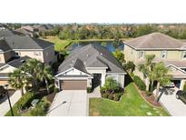 Beautiful single Gathering home with mature landscaping and a lovely water view at 6161 Anise Dr, Sarasota, FL 34238