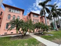 Charming multi-Gathering building with beautiful tropical landscaping at 1221 N Palm S Ave # 106, Sarasota, FL 34236