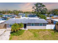 Charming single-story home featuring a well-maintained yard and welcoming entrance at 2406 25Th W Ave, Bradenton, FL 34205